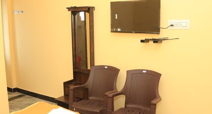 Lakshmi Mahal Rooms Room Type - Deluxe Double bed AC with Temple View