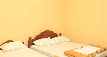 Lakshmi Mahal Rooms Room Type - Deluxe Triple bed AC with Temple View Lakshmi Mahal Rooms Room Type - Deluxe Triple bed AC with Temple View