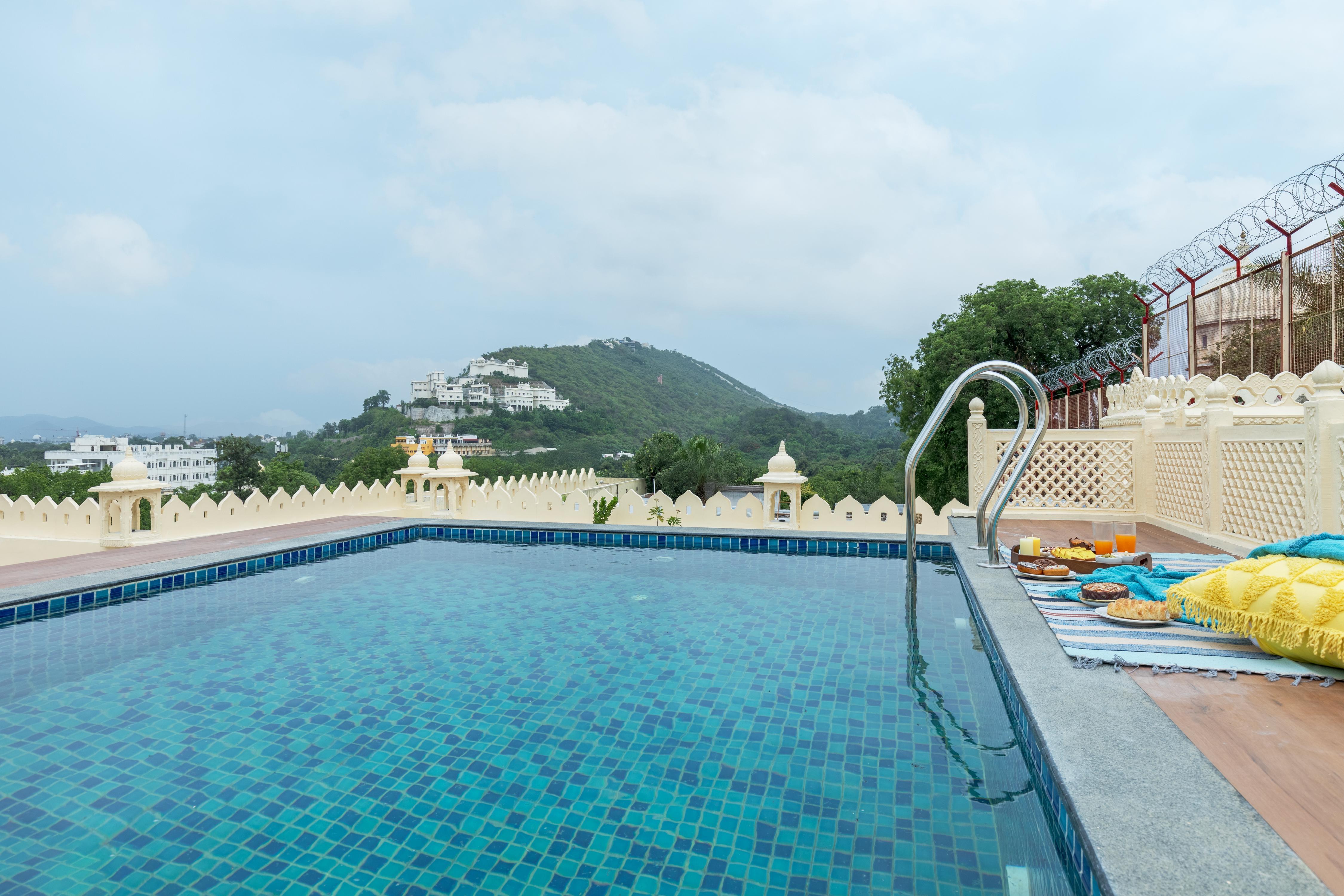 SaffronStays Rang Havelii Jharokha rooms - Tap to explore photos