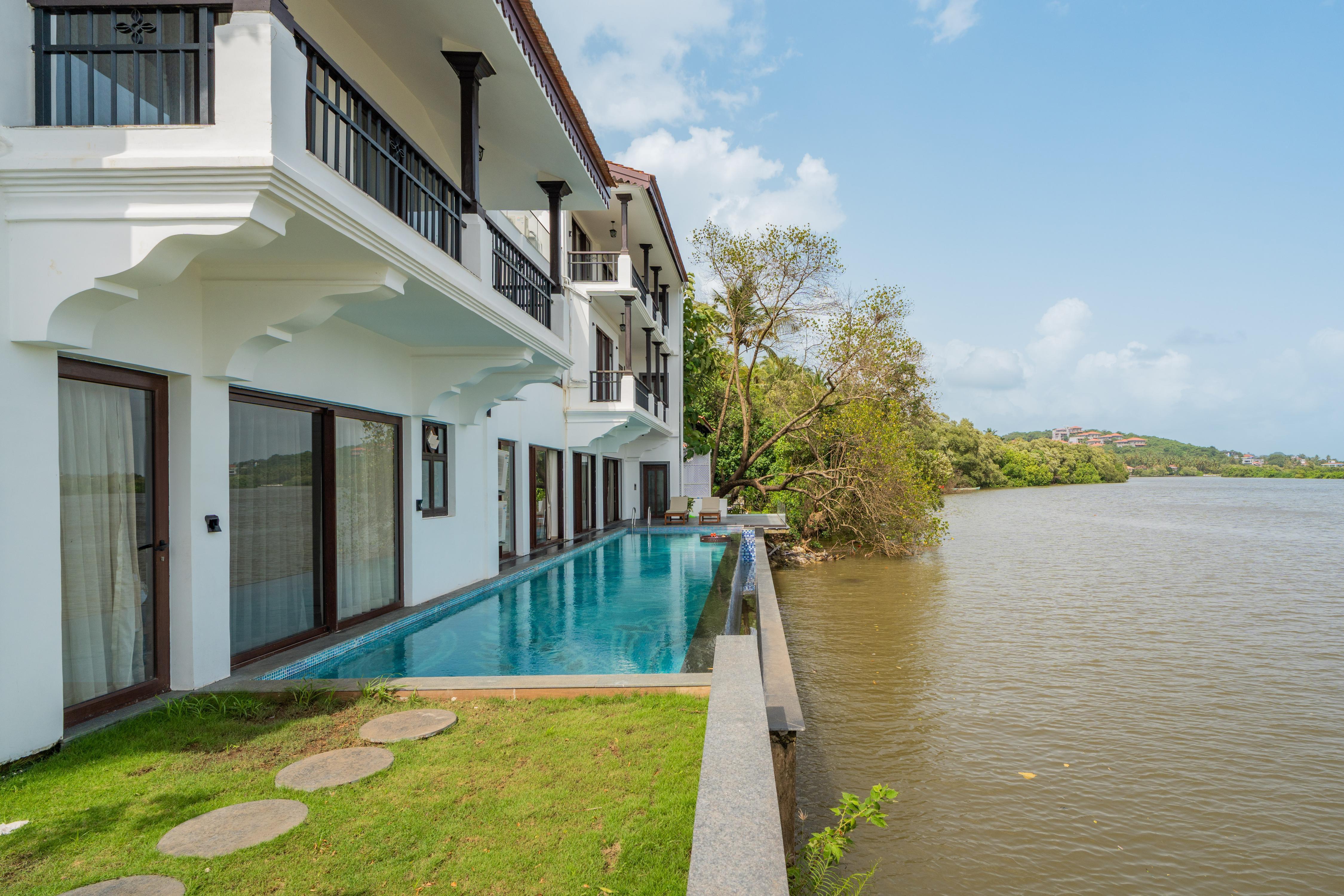ELIVAAS Prive Villa Fleuve6 BHKRiverside with Infinity Pool & Bathtub - Tap to explore photos