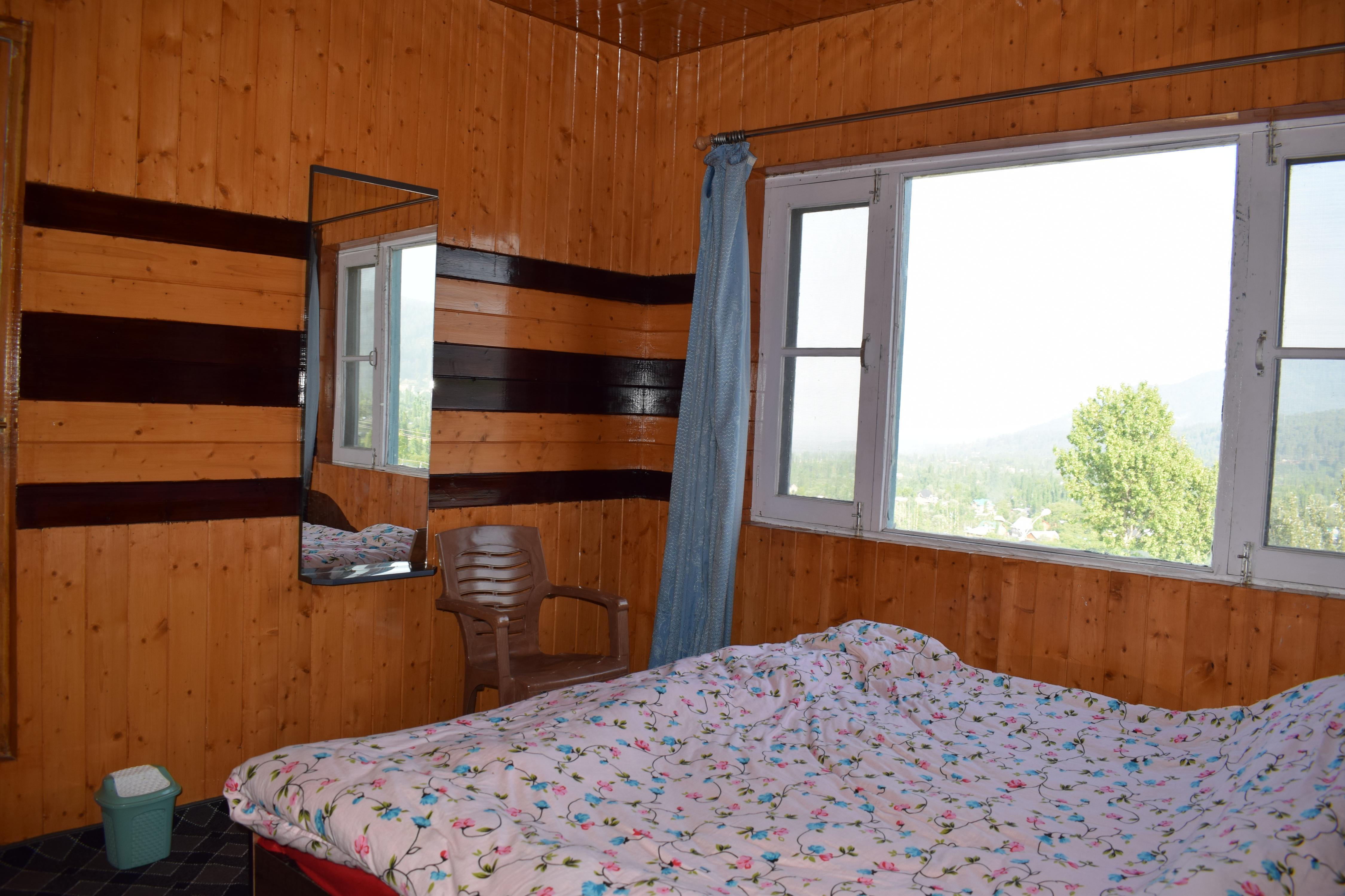 Tangmarg Homestay - Tap to explore photos