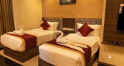Ascot Hotel Calicut Room Type - Premium with Twin Bedroom