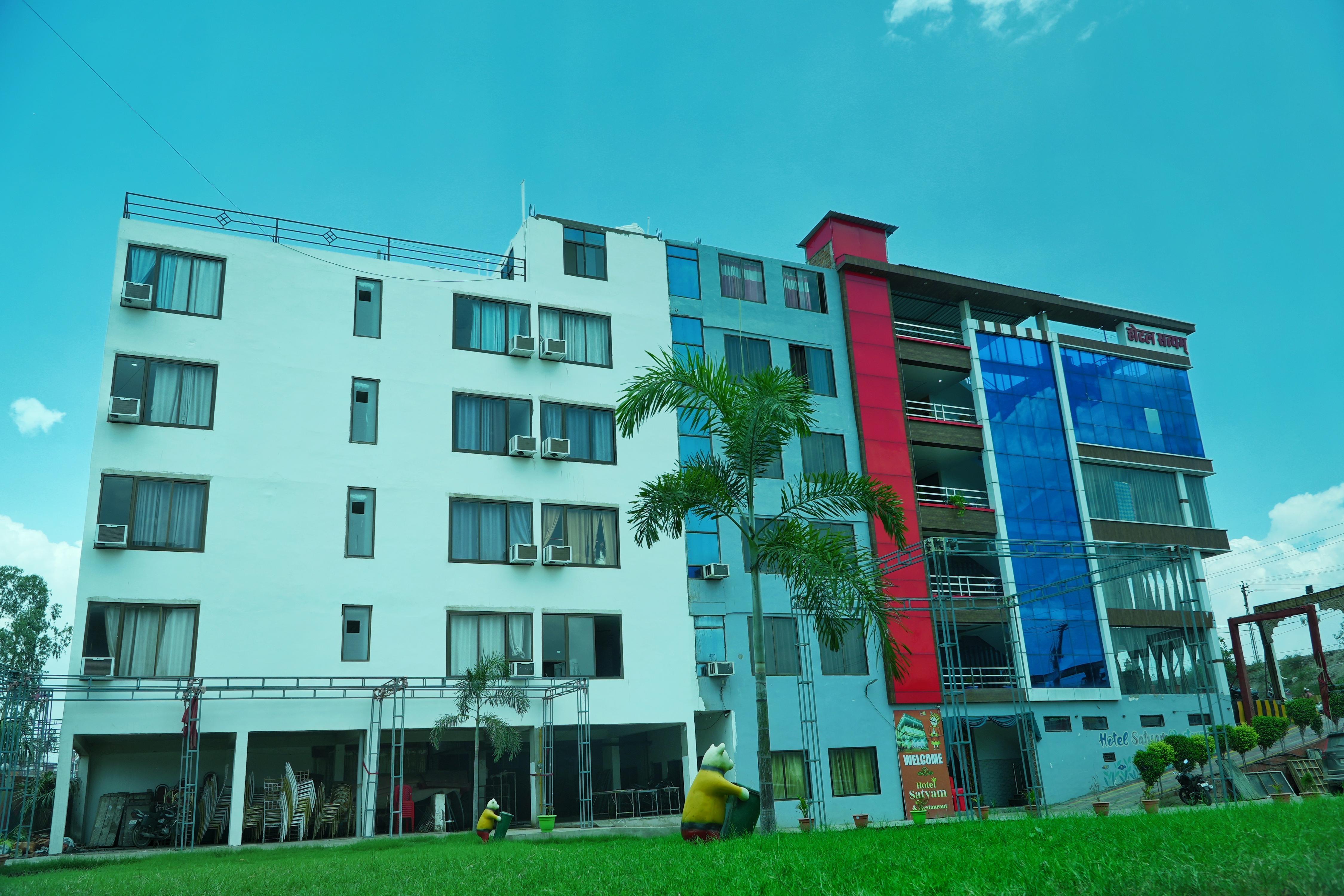 Hotel Satyam - Tap to explore photos