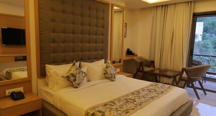 Grandeur Boutique Staycation By the Lake Fatehsagar Udaipur Room Type - Super Deluxe Room with Balcony.