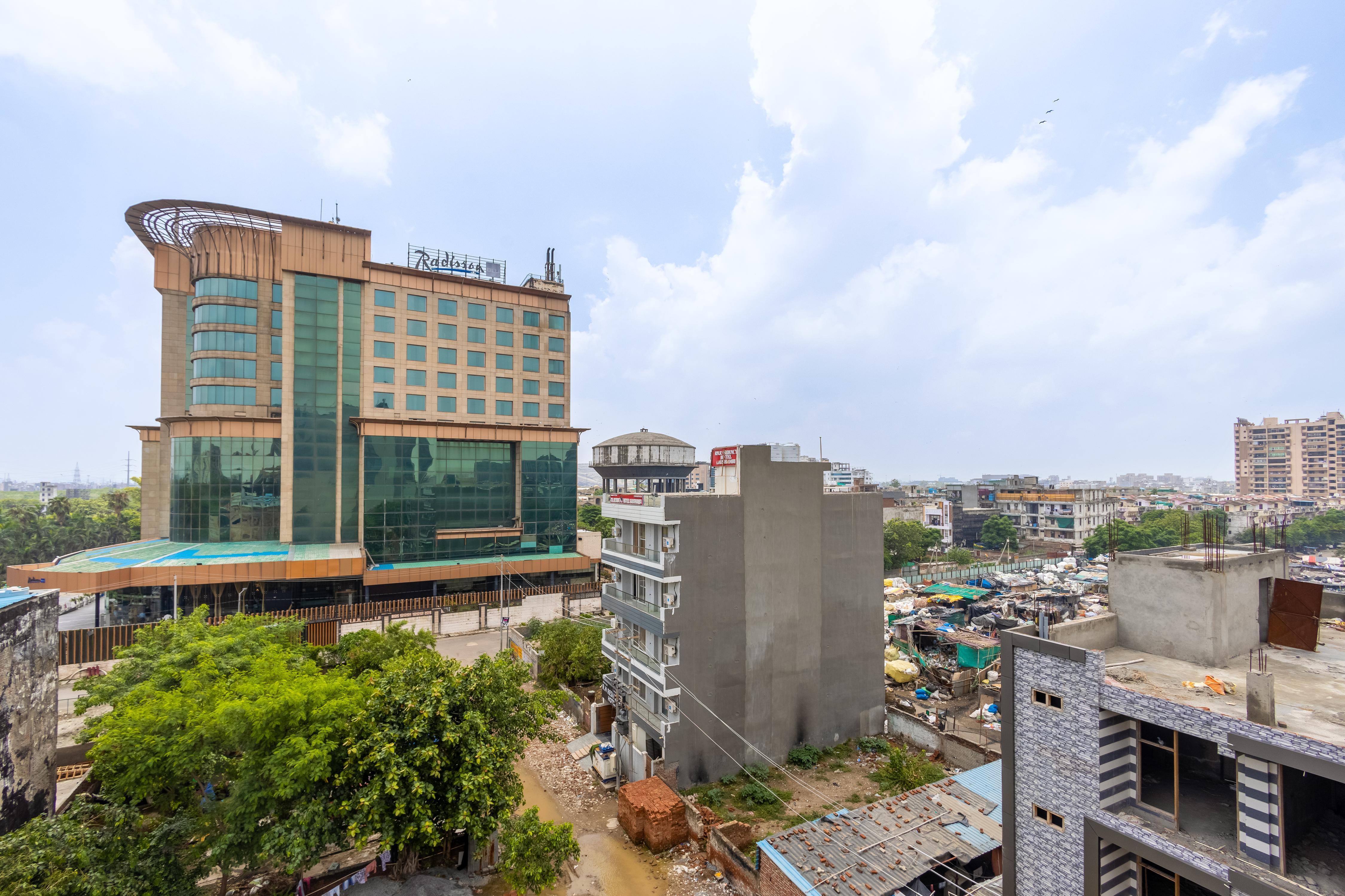 Hotel The Angel Pink Premium Rooms At Kaushambi - Tap to explore photos