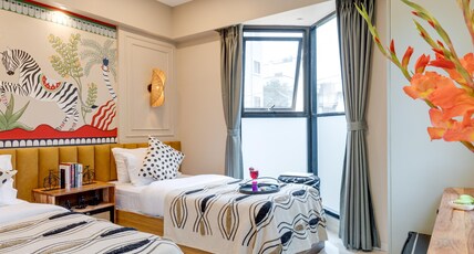 Boutique Stay by One Tree at Kharadi Room Type - Studio Executive Twin Room