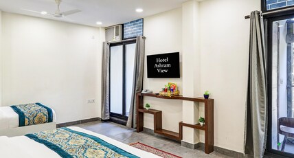 Hotel Ashram View Near Nizamuddin Railway Station Room Type - Infinity Triple room with City View and Balcony Hotel Ashram View Near Nizamuddin Railway Station Room Type - Infinity Triple room with City View and Balcony