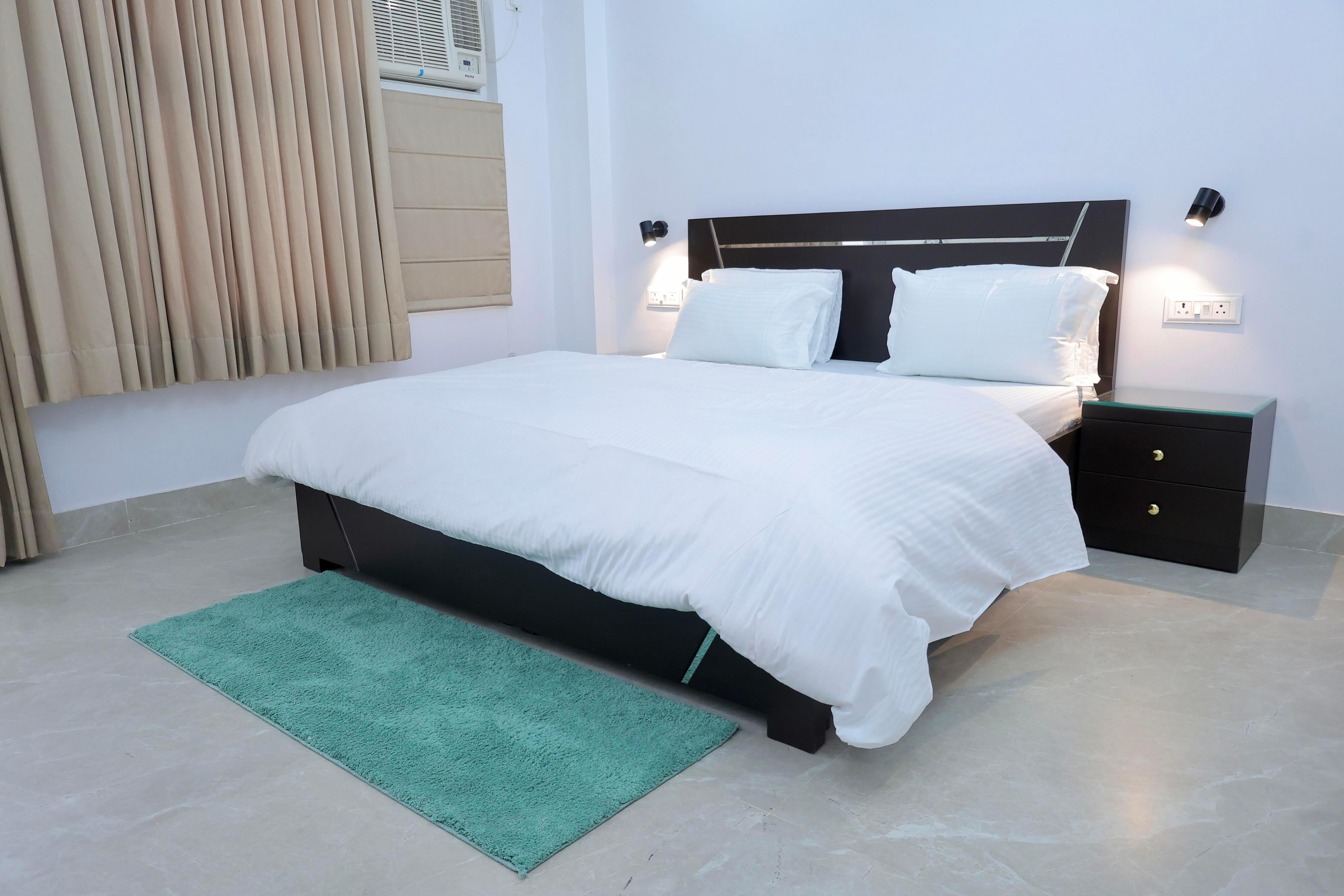 Serene 3 BHK Airbnb near Yashobhoomi - Tap to explore photos