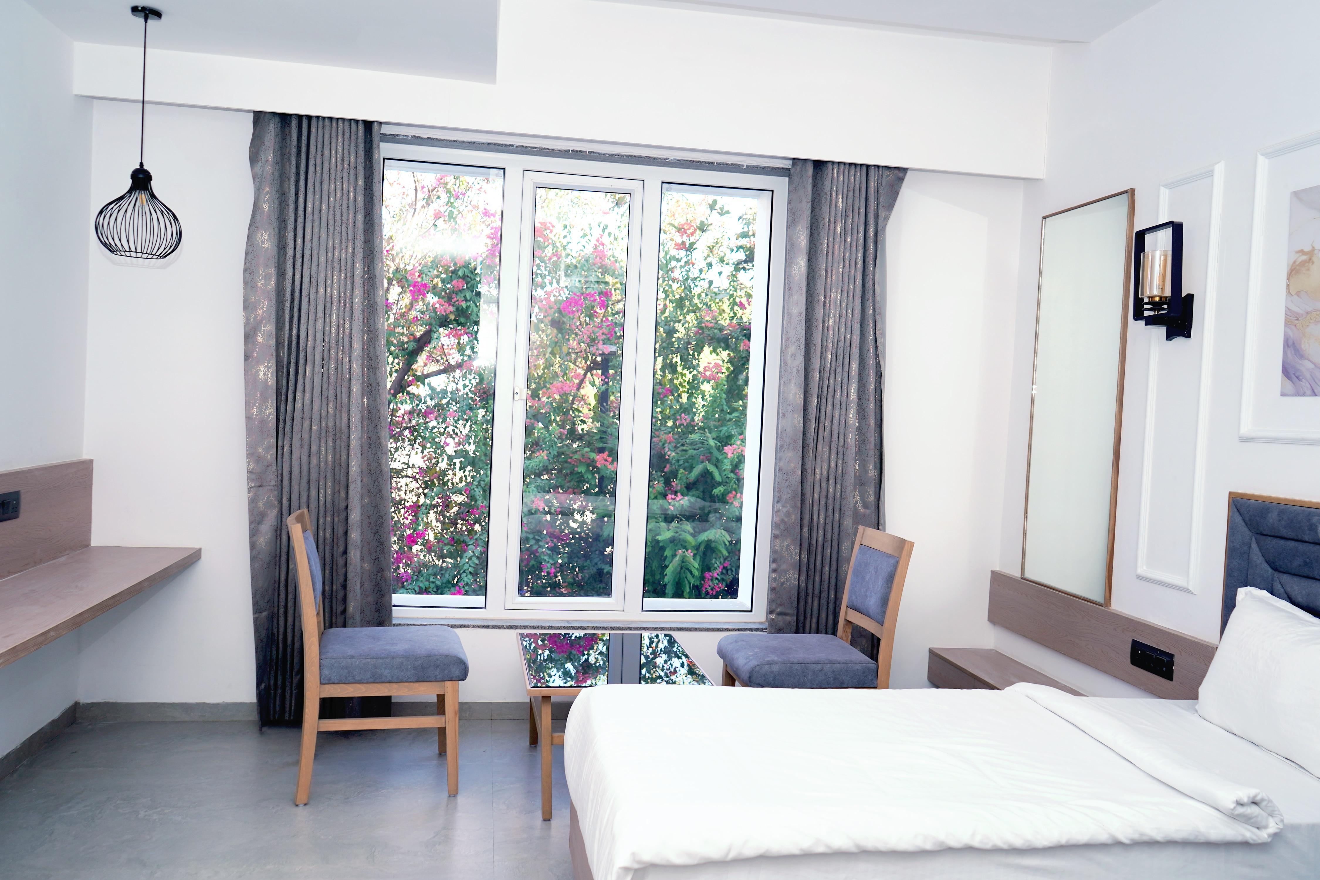 HOTEL RIVERSIDE GREENS - Tap to explore photos