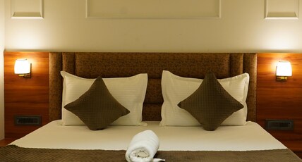 The Aura Luxury Hotel Shahdara Railway Station Room Type - Deluxe Double Room with Smart TV