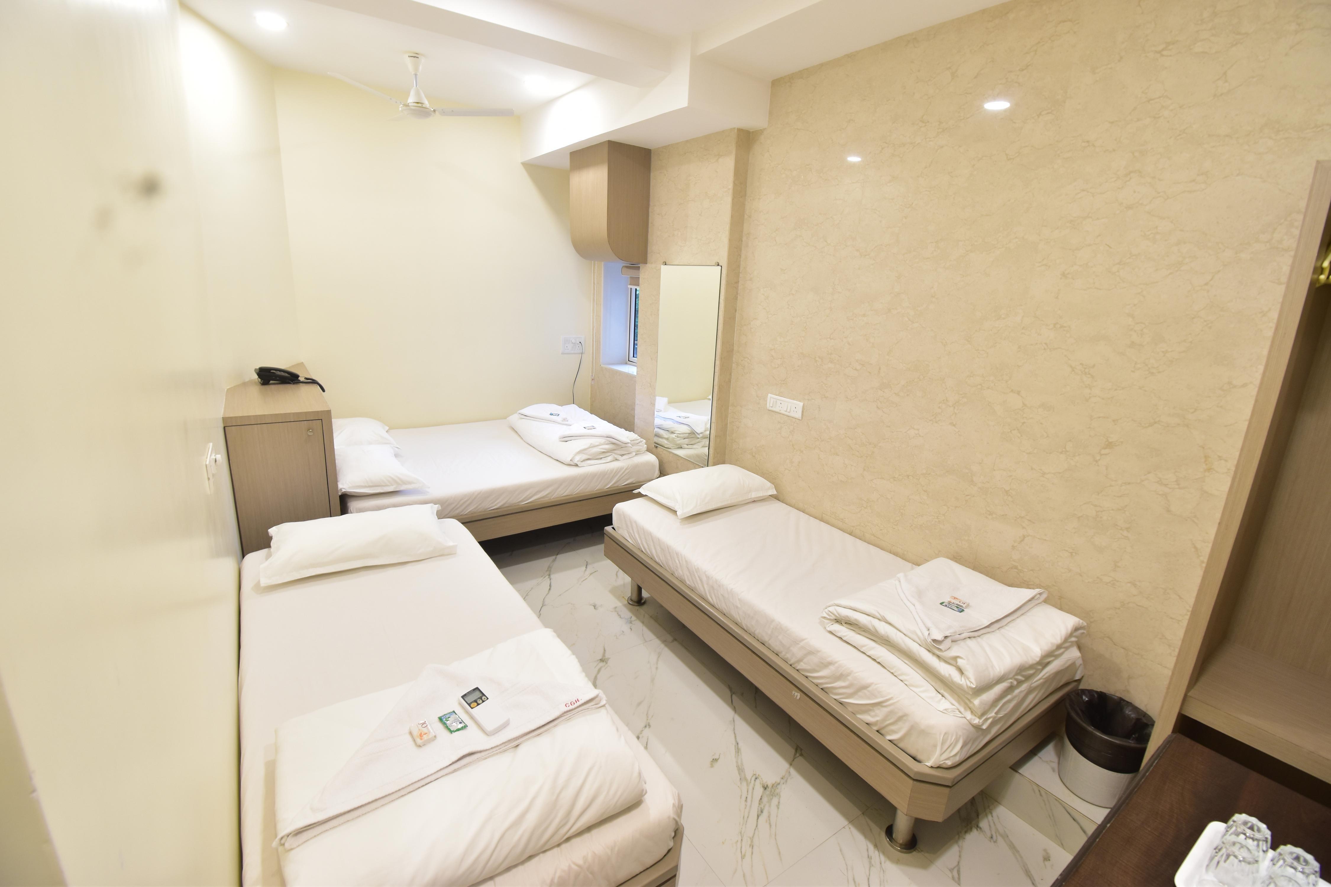 City Guest House. Room Type - Standard 4 Bed Room