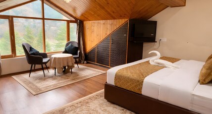 Hotel Oscar Manali (Old Manali) Room Type - Attic Room with Mountain and Orchid view Hotel Oscar Manali (Old Manali) Room Type - Attic Room with Mountain and Orchid view