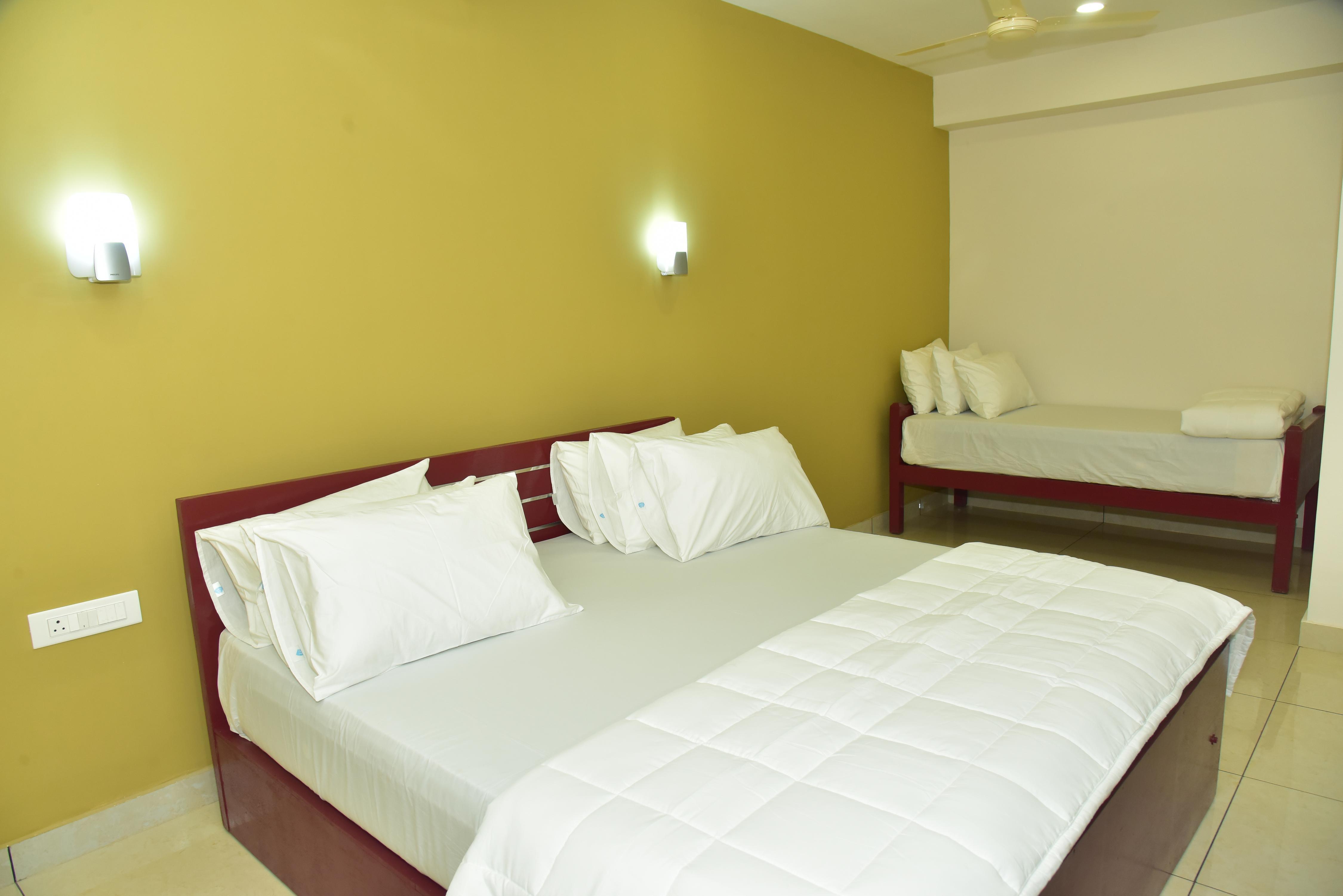 DOWN TOWN HOLIDAYS KOVALAM Room Type - Family Comfort Room 205