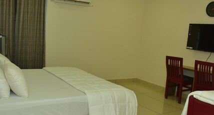 DOWN TOWN HOLIDAYS KOVALAM Room Type - Deluxe Family Suite 206