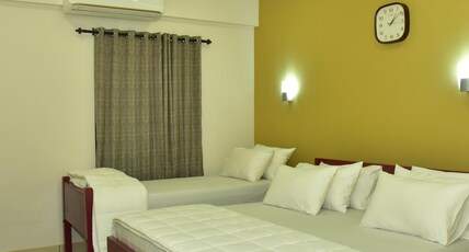 DOWN TOWN HOLIDAYS KOVALAM Room Type - Family Comfort Room 204