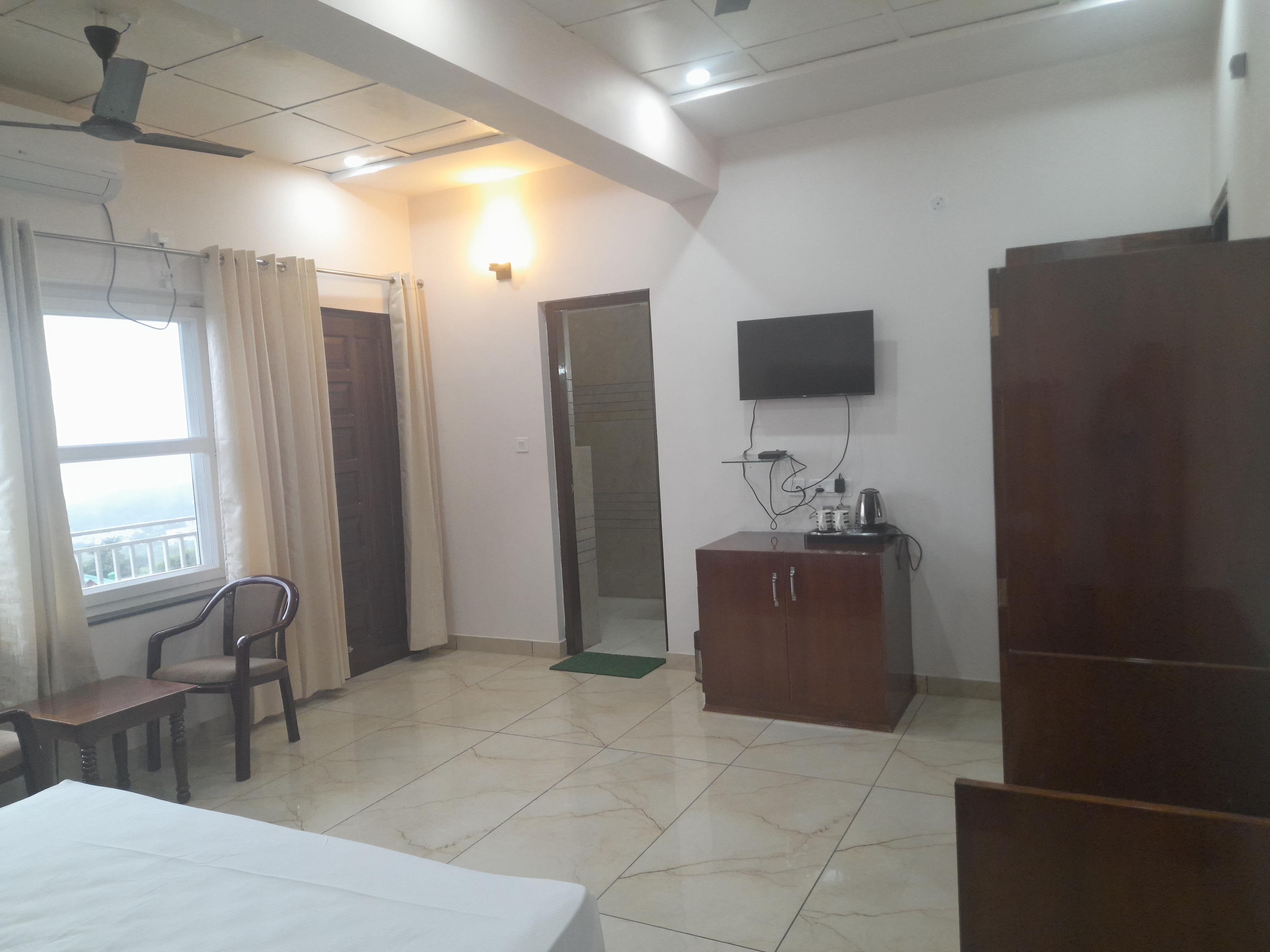 Hotel DHARAMSHALA AYUSH HEALTH PARADISE Room Type - Deluxe Room with Mountain View King Bed Hotel DHARAMSHALA AYUSH HEALTH PARADISE Room Type - Deluxe Room with Mountain View King Bed