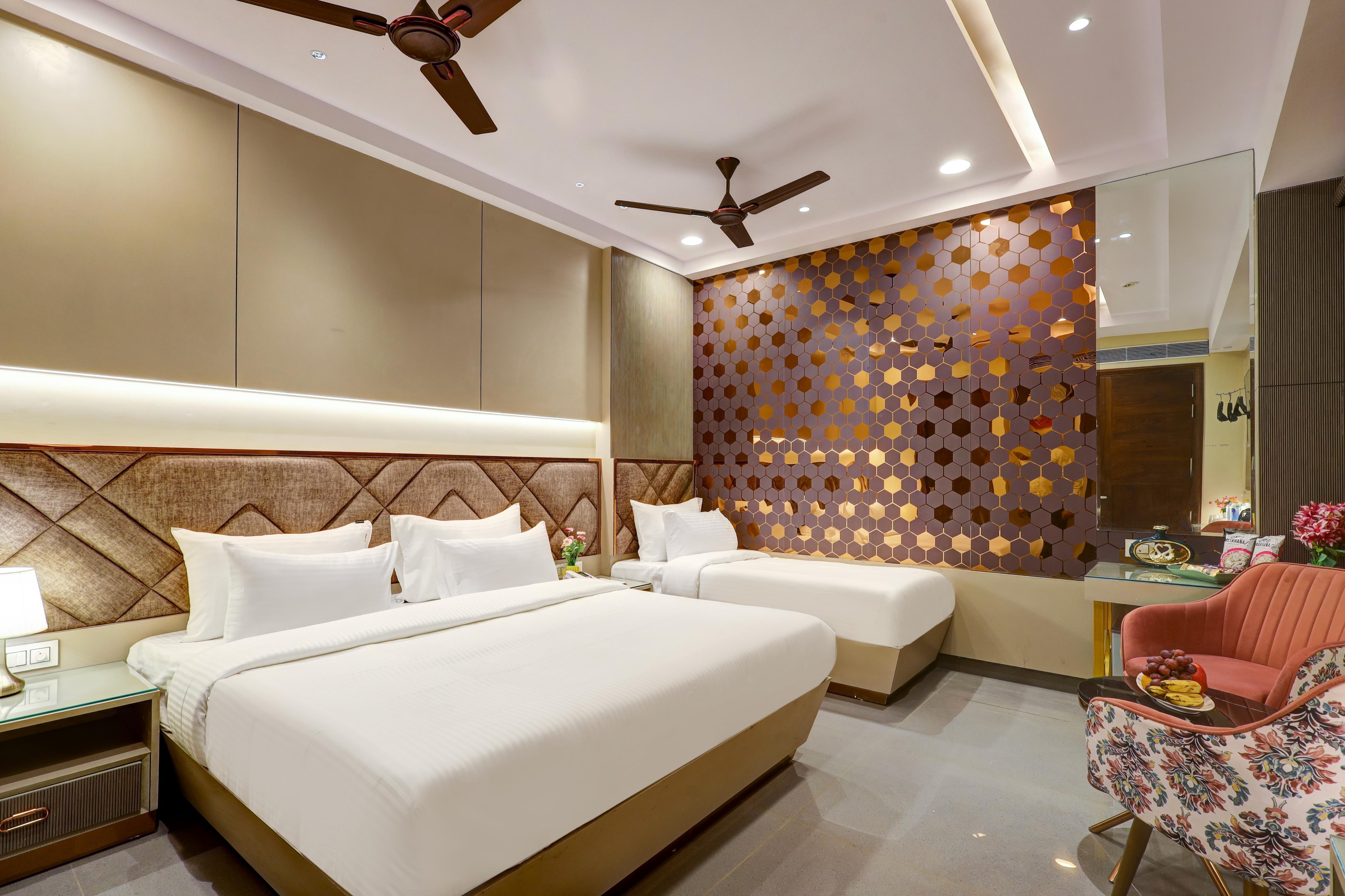 Hotel Ruhi Dx - Tap to explore photos