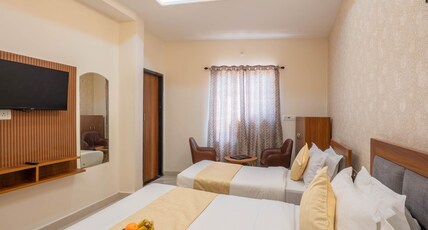 Perfectstayz Value Om Palace near Prem Mandir with Parking Room Type - Family Triple Bedroom