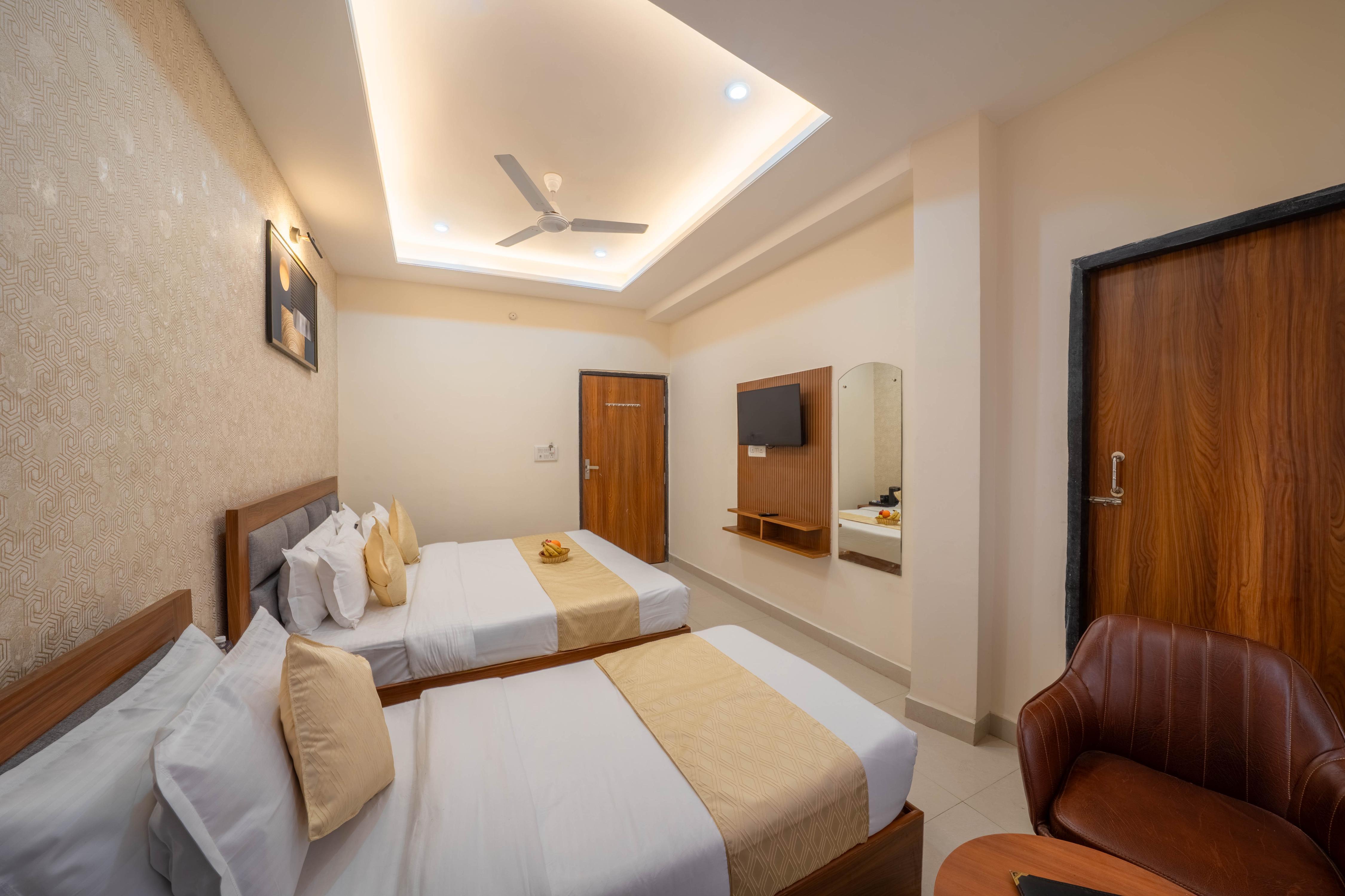 Perfectstayz Value Om Palace near Prem Mandir with Parking - Tap to explore photos