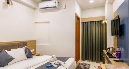 The Code Hotel Room Type - Deluxe AC Room