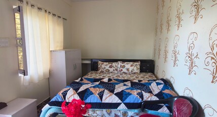 Kanakdhara Homestay Room Type - LOTUS