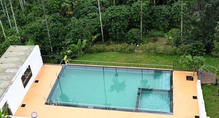 Wayanad Farm Heritage Room Type - Deluxe Suite Pool View Wayanad Farm Heritage Room Type - Deluxe Suite Pool View
