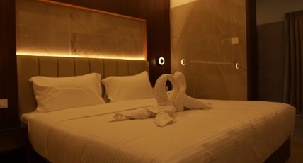 Arthana Residency Hotel Room Type - Standard King Room