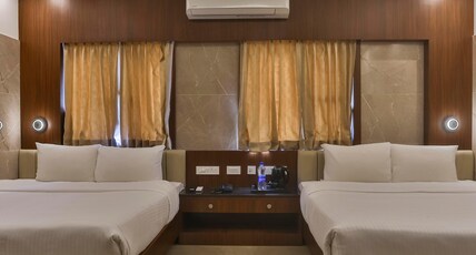 Arthana Residency Hotel Room Type - Suite Room with 3 King Size Bed - Spacious family Room Arthana Residency Hotel Room Type - Suite Room with 3 King Size Bed - Spacious family Room
