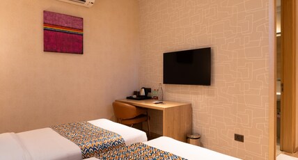Hotel Bluestone Prime (Nehru Place) by The Cosy hotel Room Type - Standard Double or Twin Room
