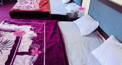 Hotel Bluestar Room Type - 5 bed with lake view Hotel Bluestar Room Type - 5 bed with lake view