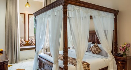 The Classic Crown Udaipur A Luxury Hotel by Lake Pichola Room Type - Imperial Room with Poster bed and Jharokha The Classic Crown Udaipur A Luxury Hotel by Lake Pichola Room Type - Imperial Room with Poster bed and Jharokha