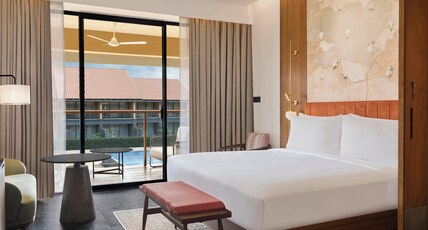 Hilton Hyderabad Genome Valley Resort & Spa Room Type - Deluxe Balcony Garden View