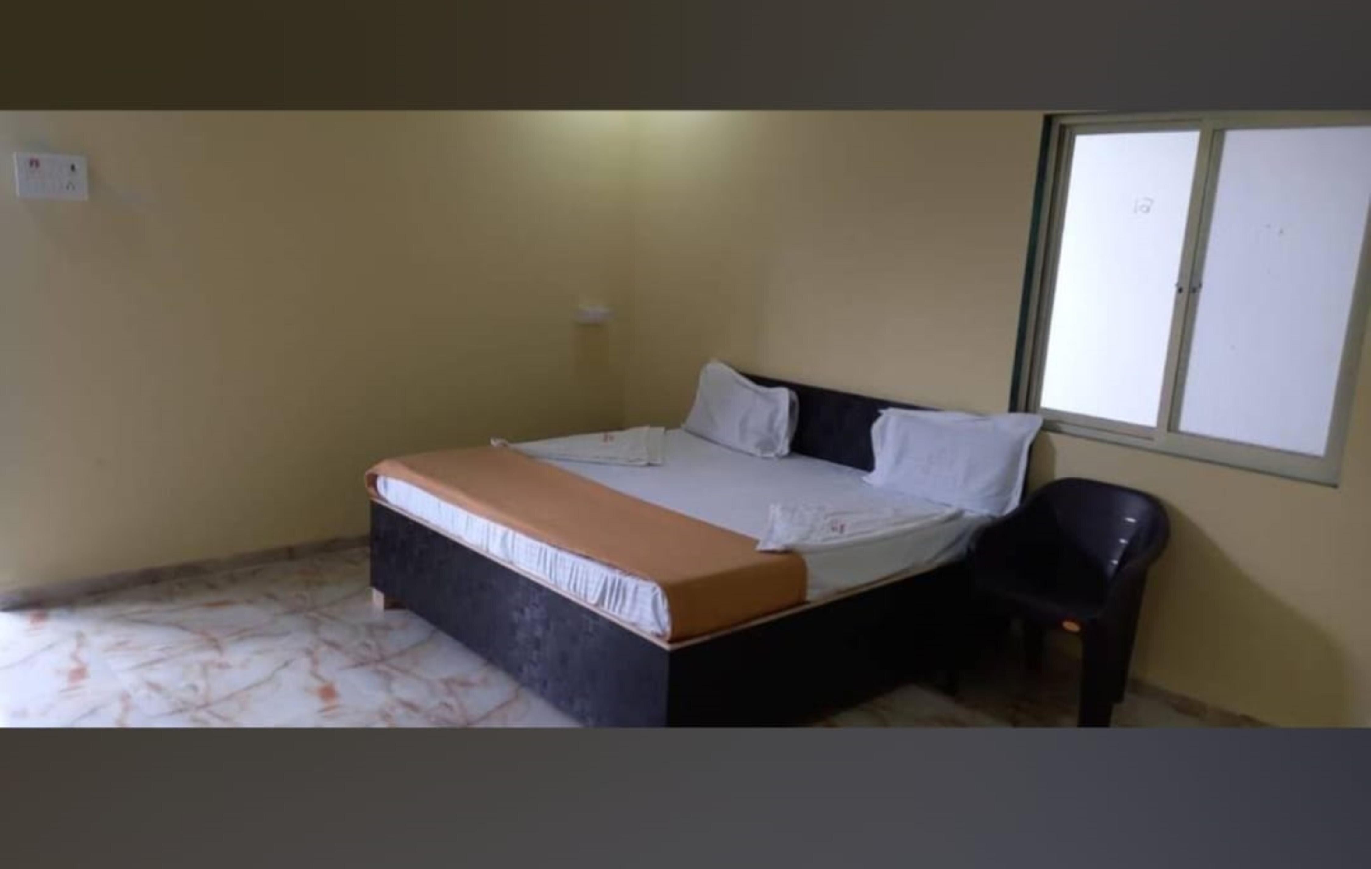 Samadhan Lodging and Boarding - Tap to explore photos