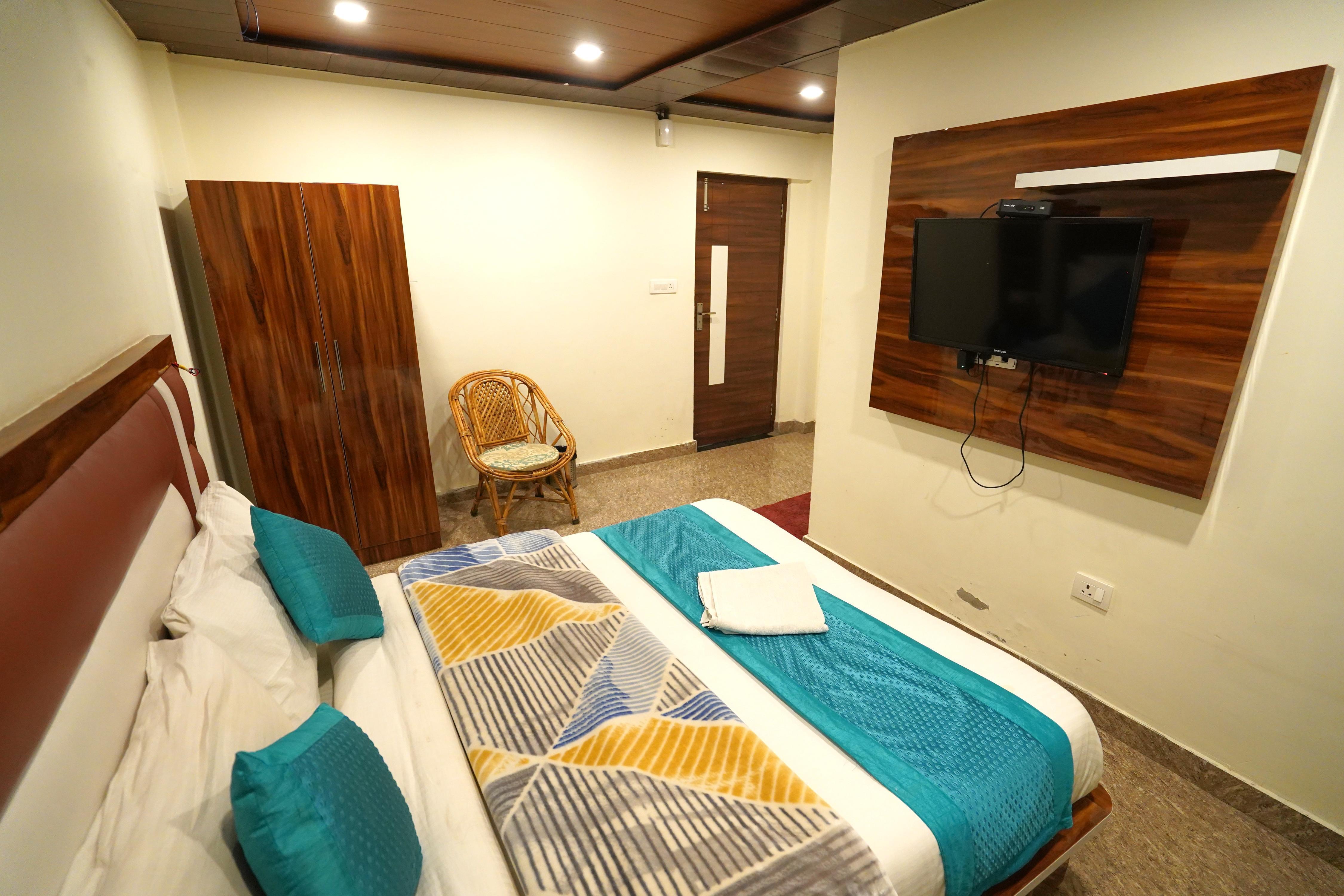Hotel Divine Ganga by OXYGEN HOTELS - Tap to explore photos