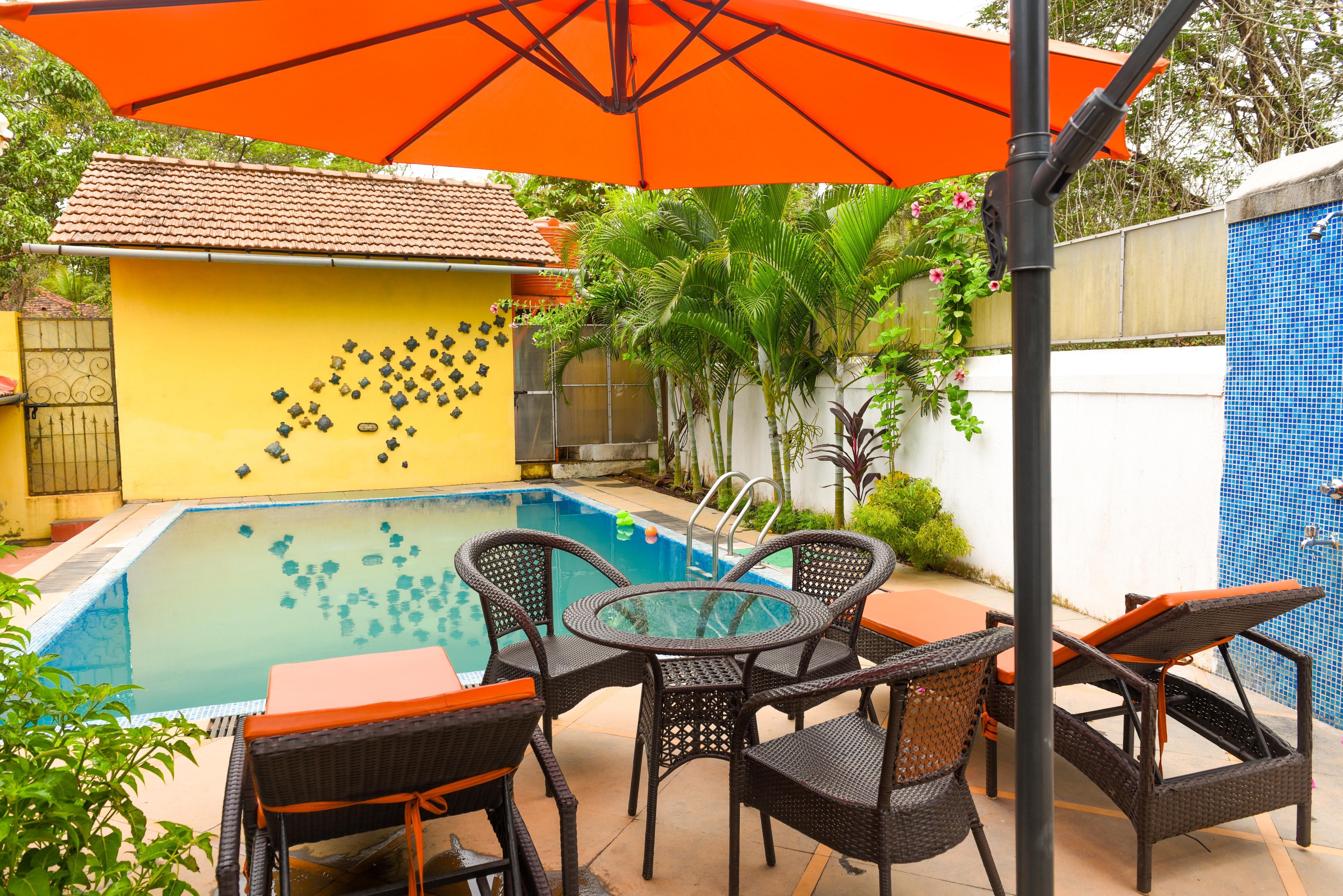 ELIVAAS Signature Terra Rosa | Portuguese styled 4 BHK Villa With Pvt Pool - Tap to explore photos