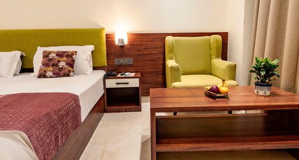 Swastik Stays Room Type - Deluxe Room with Balcony Swastik Stays Room Type - Deluxe Room with Balcony