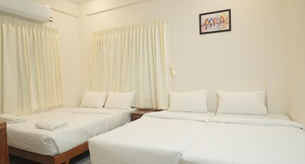 Vallimony Luxury Stays- Padmanabhaswamy Temple Room Type - Quadruple Room 101