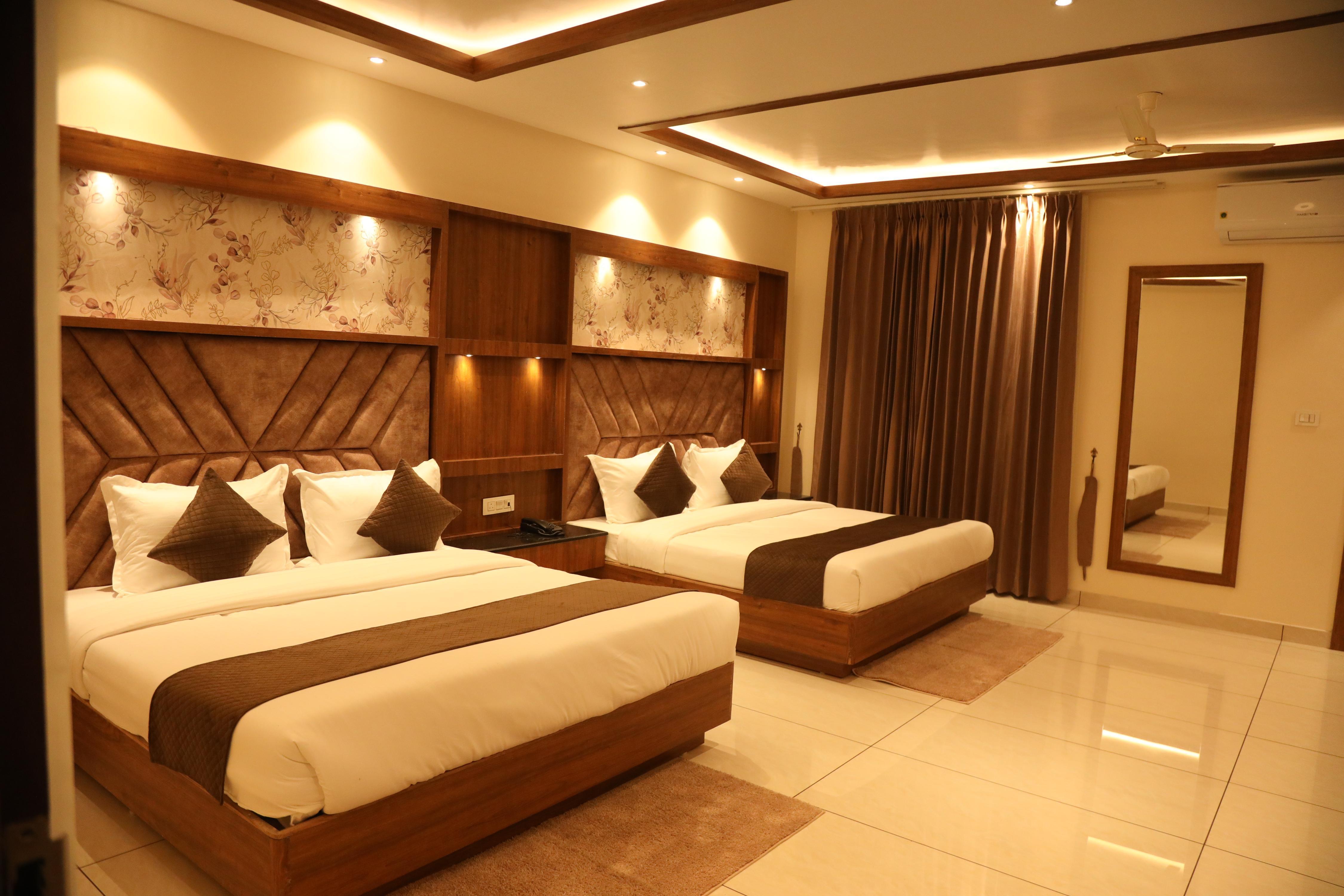 Hotel Sahil Suites Room Type - Super Deluxe Family Four Bed Room