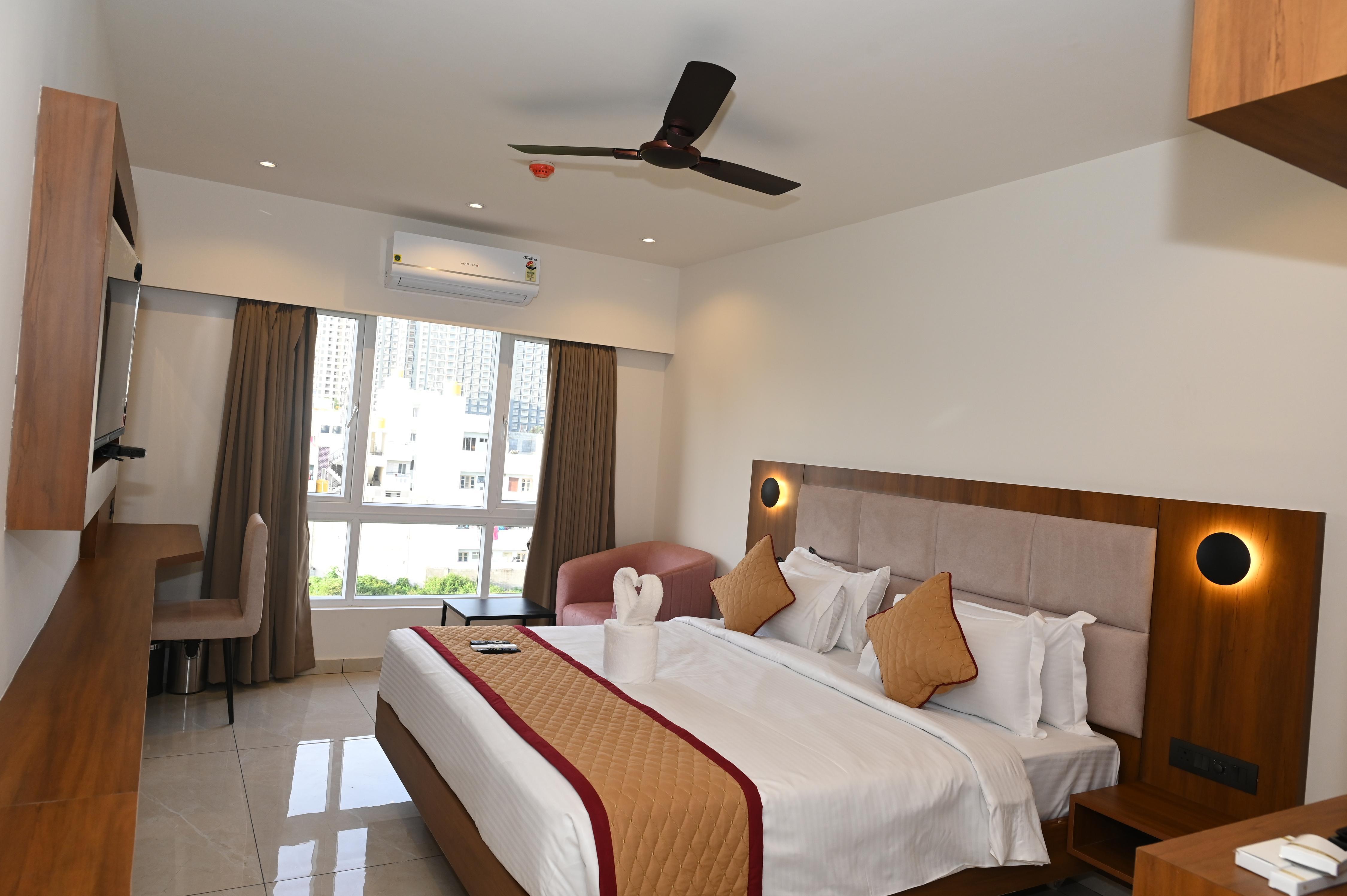 Good One Suites | Manyata Tech Park Room Type - Suite Bed Room with City View