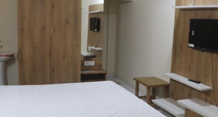 HOTEL ADARSH ROOM'S Room Type - Deluxe Room with Balcony