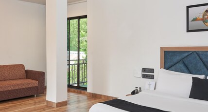 Coral Sand Beach Resort By Privy Stays Room Type - Suite AC Room With Balcony and Tropical View Coral Sand Beach Resort By Privy Stays Room Type - Suite AC Room With Balcony and Tropical View