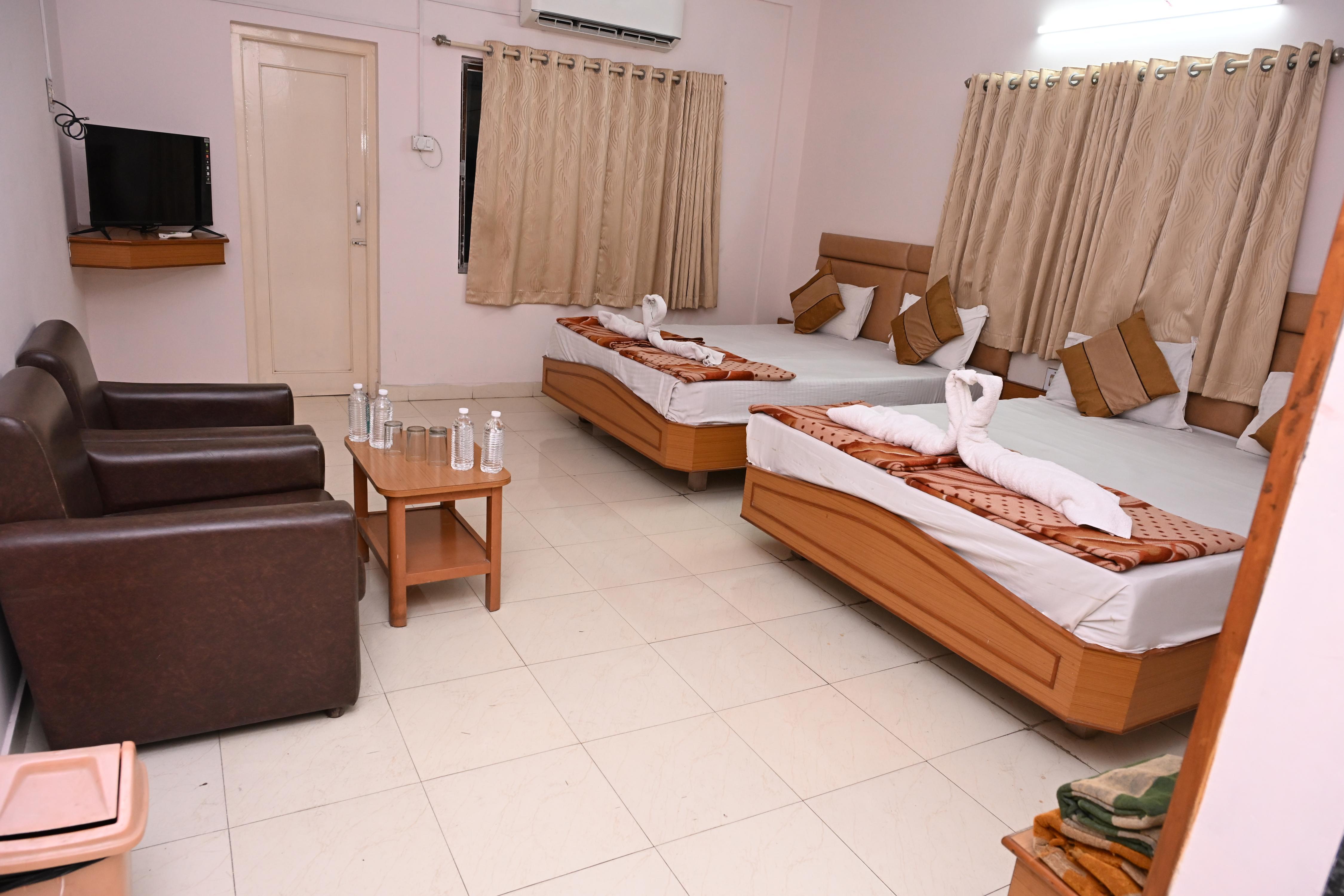 Hotel Ganga, Dwarka - Tap to explore photos