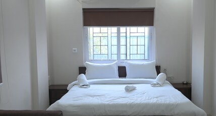 Yuvi Grand Residency Room Type - Deluxe Room