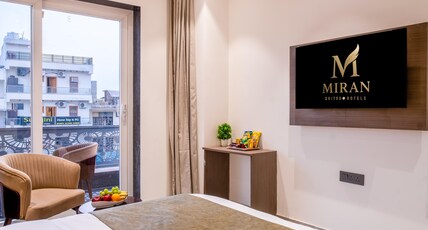 Miran Hotel & Suites - Mathura Road Faridabad Room Type - Superior Room with Private Balcony Miran Hotel & Suites - Mathura Road Faridabad Room Type - Superior Room with Private Balcony