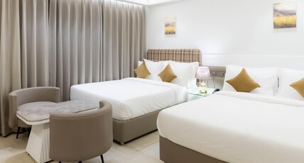 Emerald Luxe A Boutique Hotel Chandigarh Mohali Room Type - Family Twin Bed Room Emerald Luxe A Boutique Hotel Chandigarh Mohali Room Type - Family Twin Bed Room