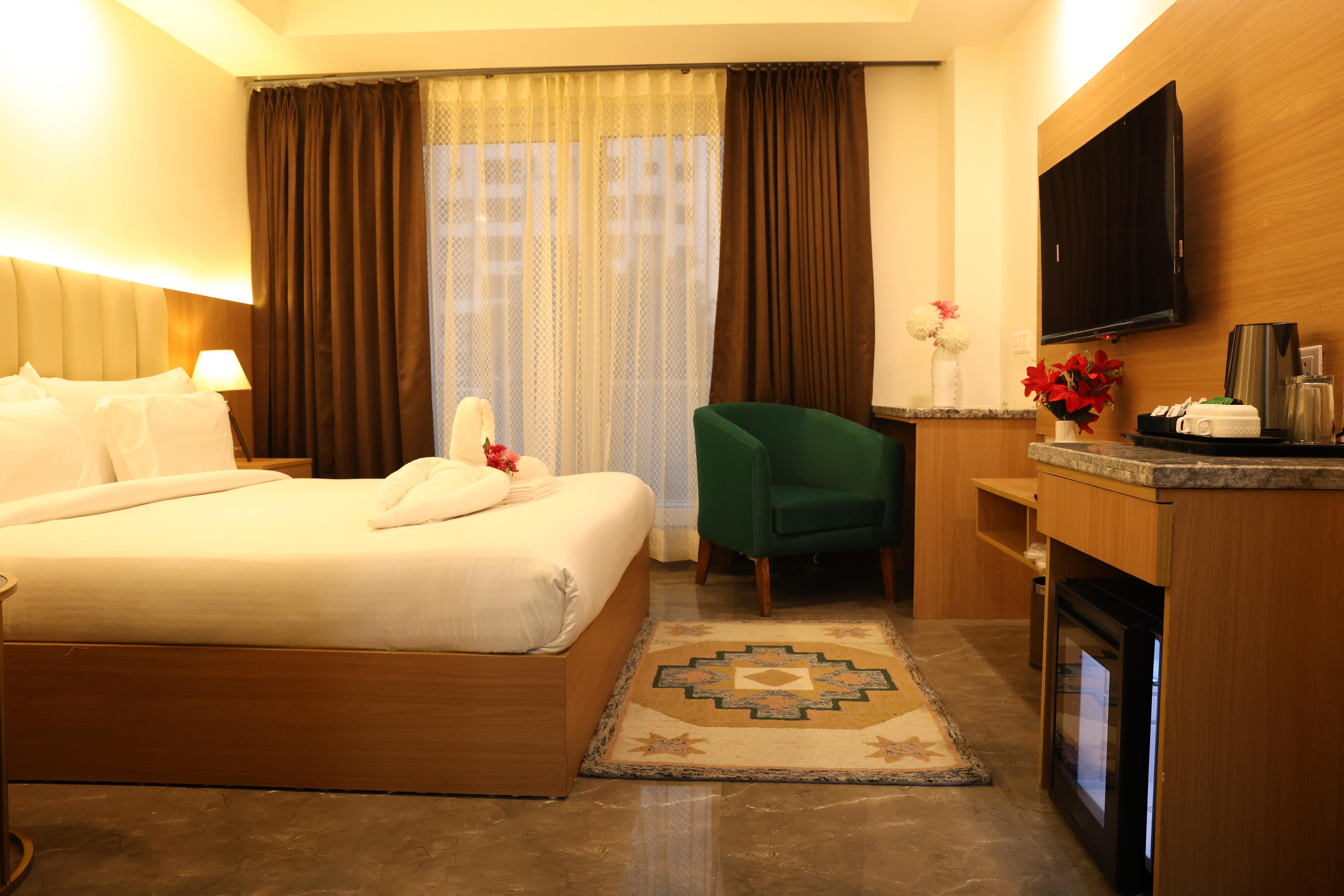 Royal Raven Hotel & Banquet Greater Noida Nearby India Expo Centre & Mart Room Type - Suite Room with Private Balcony