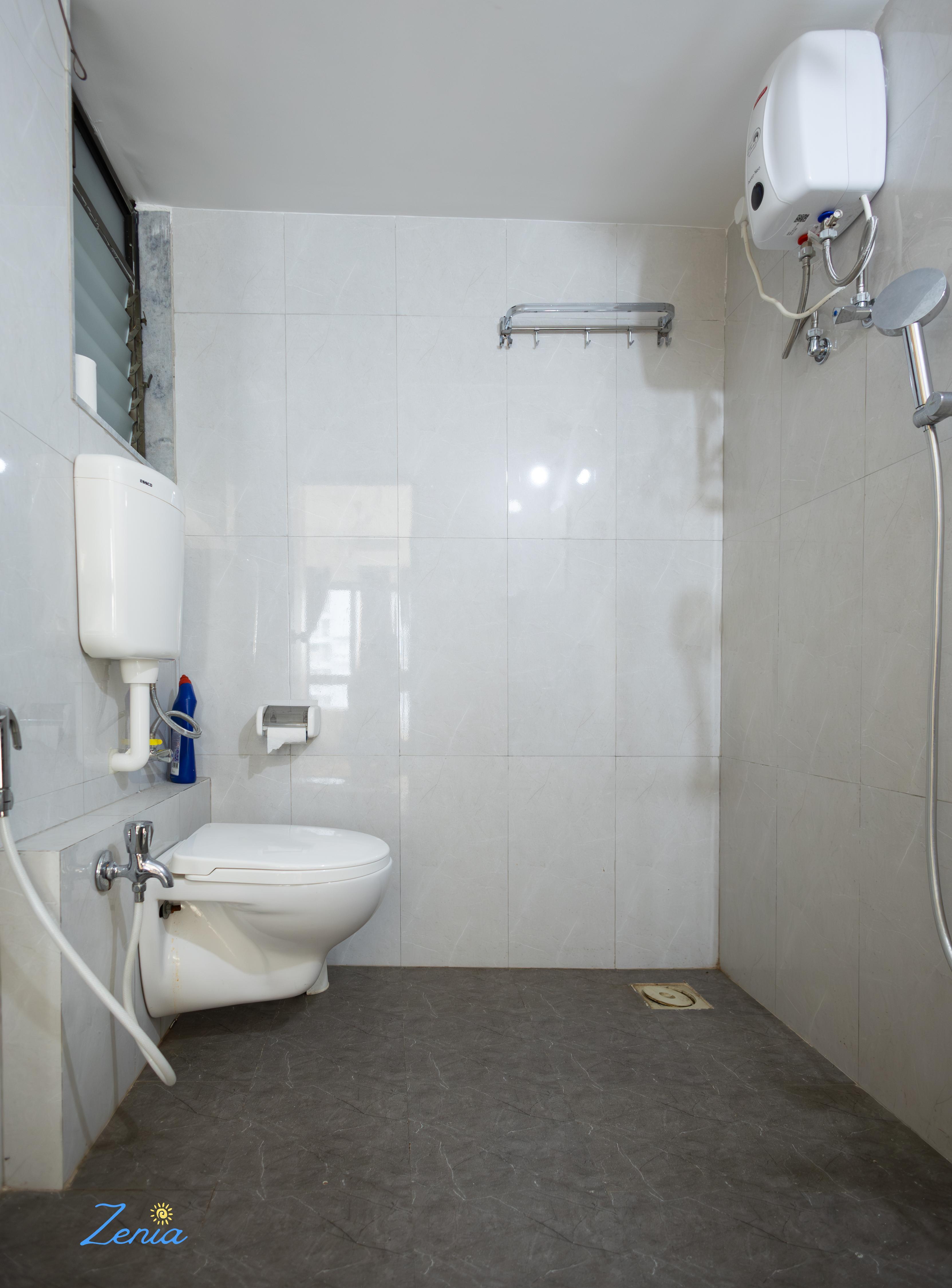Airport Apartments by Zenia (2 BHK) - Tap to explore photos