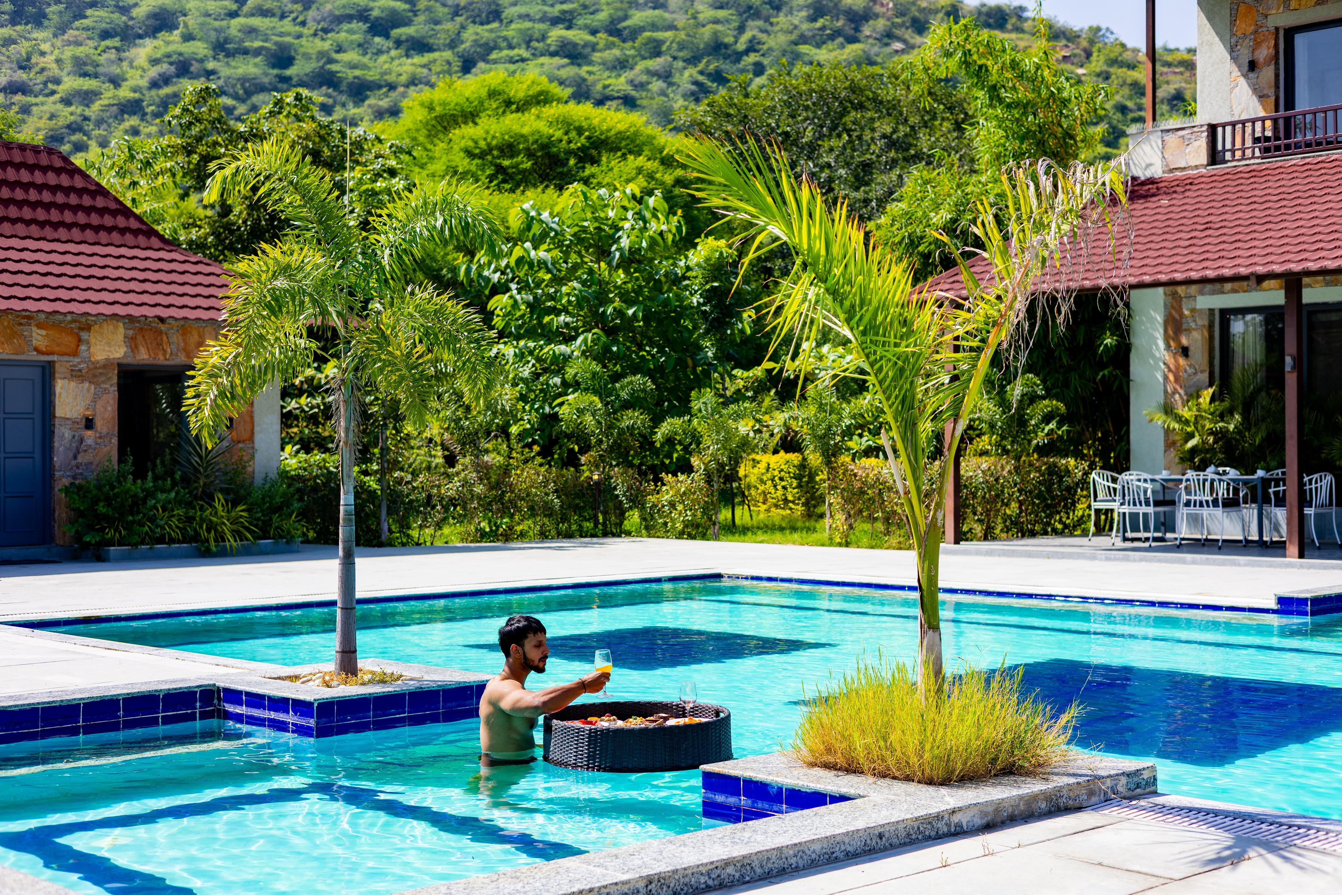 ELIVAAS Signature Raas Stays | 4 BHK Retreat With Pvt Pool & Scenic Aravali Views - Tap to explore photos