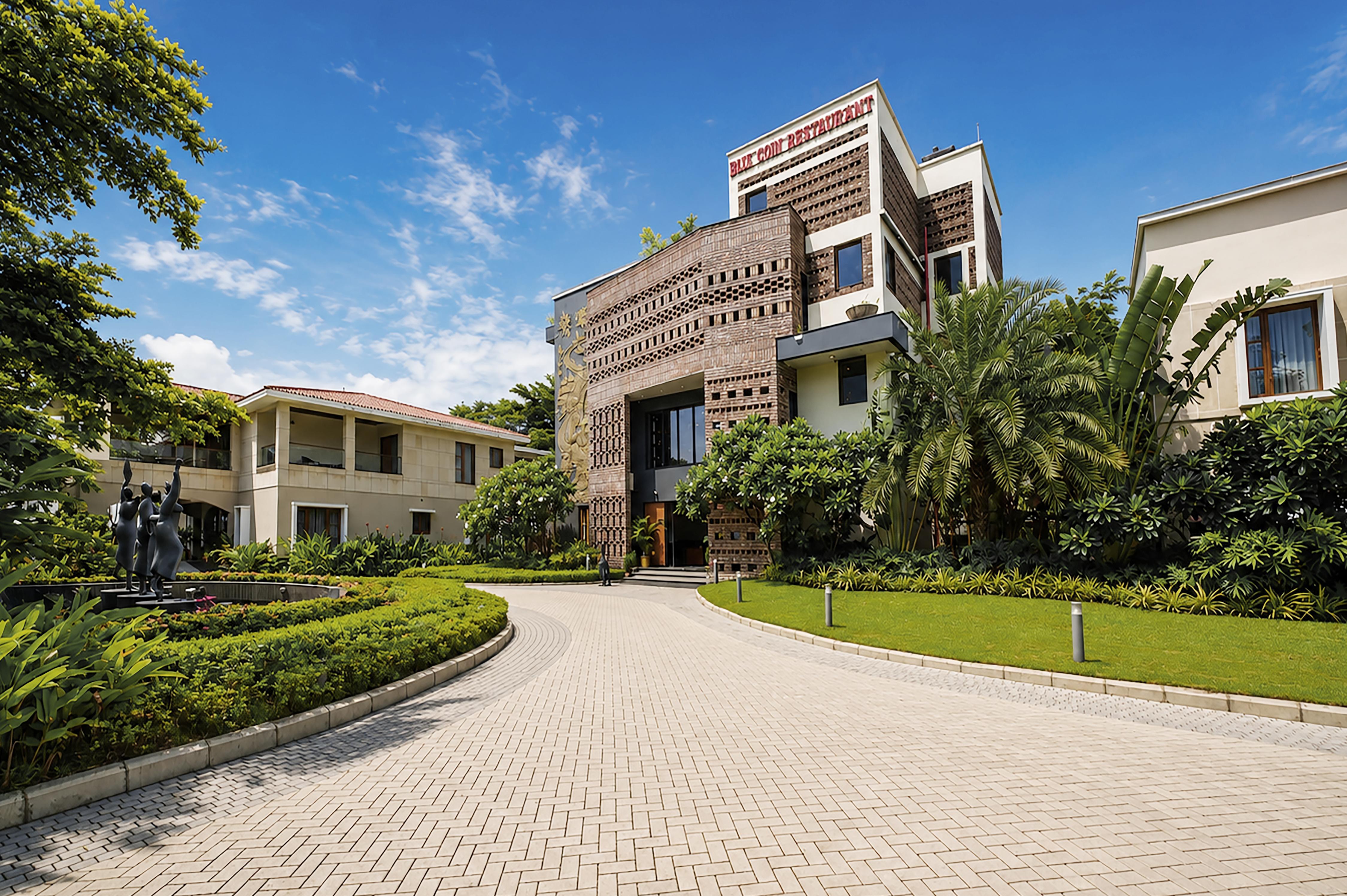 The Brick and Palm Resort - Tap to explore photos