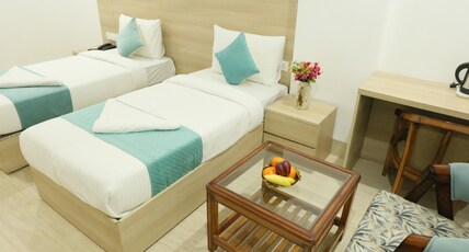 CORPORATE STAYS-GOLF COURSE ROAD Room Type - Studio Room with Twin Beds